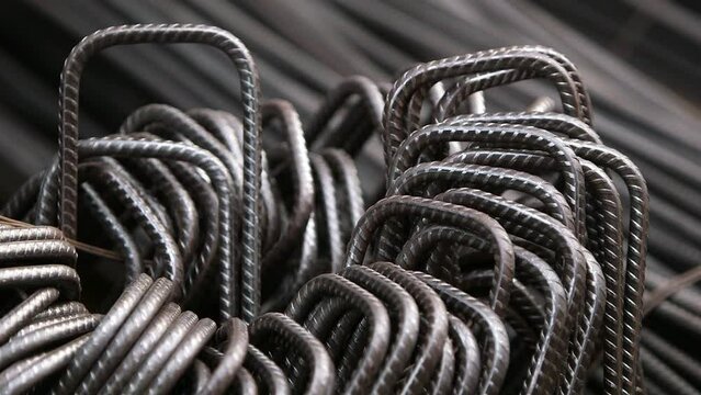 A stack of concrete rebar links. Steel rods in shape