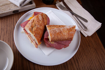 Salami and cheese sandwich with mustard