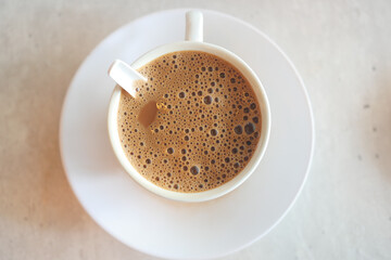 close up of cup of milk tea on table 
