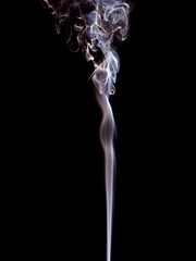 A thin stream of white smoke rises gently upwards