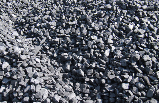 A Stack of Black Lump Coal as a Background Image.