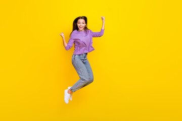 Fototapeta na wymiar Full length photo of overjoyed lady wear trendy clothes rejoice glad triumph hooray yes empty space isolated on yellow color background