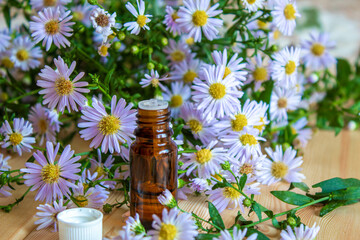 flower oil in glass bottles.homeopathy.selective focus
