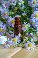 flower oil in glass bottles.homeopathy.selective focus