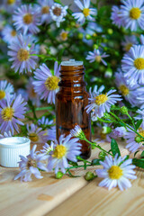 flower oil in glass bottles.homeopathy.selective focus