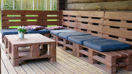 Benches and a table made of euro pallets, Outdoor furniture design with upcycling concept.