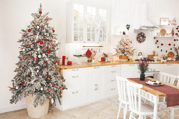 Christmas decoration on the kitchen. Kitchen interior holidays. New Year design.