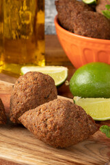 Traditional kibbeh on cutting board.