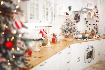 Christmas decoration on the kitchen. Kitchen interior holidays. New Year design.