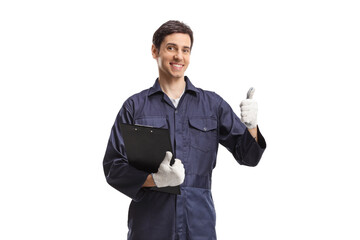 Worker in a uniform holding a clipboard and showing thumbs up