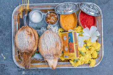 Flower and coconut offerings for Hindu religious ceremony or holy festivals - pasupu kumkuma