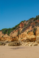 Maria Luisa beach with rock formation in Albufeira, Algarve, Portugal.
