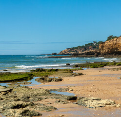Maria Luisa beach with rock formation in Albufeira, Algarve, Portugal.
