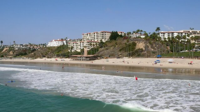A sunny day on the beach West of the San Clemente Pier in Orange County, California.