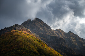 Fototapeta na wymiar dramatic cloudy sky over the Pyrenees mountains in autumn