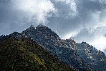 Obraz na płótnie Canvas dramatic cloudy sky over the Pyrenees mountains in autumn