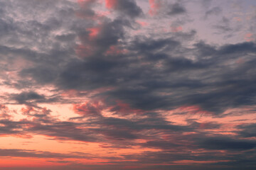 Twilight sky with effect of light pastel tone. Colorful clouds on the dramatic sunset sky