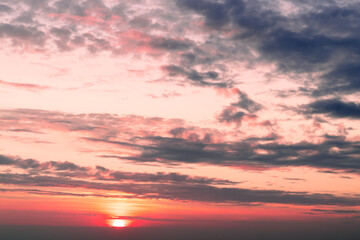 Twilight sky with effect of light pastel tone. Colorful clouds on the dramatic sunset sky