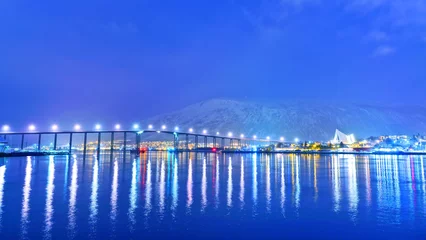 Tuinposter View of Tromso, Norway at night in winter. © Javen