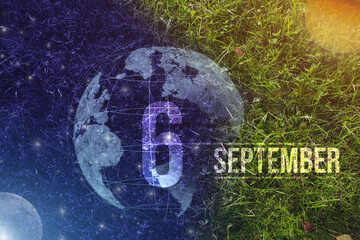September 6th. Day 6 of month, Calendar date. Day to night background concept. Scene with globe the green grass with sun, stars, moon and calendar date. Autumn month, day of the year concept.
