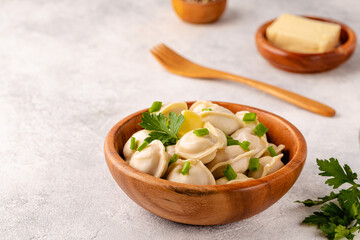 Homemade meat dumplings - russian pelmeni.