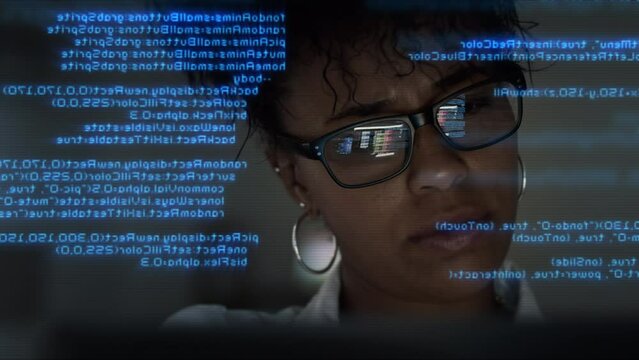 
Lateral Dolly of App Programmer Looking at Hologram of Program Code Machine Learning Data Algorithm.  Portrait of African American Female Startup Digital Entrepreneur Working on Computer.