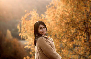 woman in the autumn forest. Fall. Autumn. 