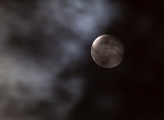 Naklejka na ściany i meble Full Moon at Night with Passing Clouds