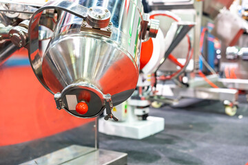 close up discharge gate of tank mixer and rotate or shaker automatic machine for food industrial or...