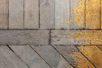Background, texture of the surface of an old wooden parquet