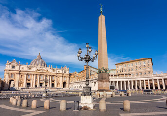 Fototapeta na wymiar St. Peter's basilica and Egyptian obelisk on St. Peter's square in Vatican, center of Rome, Italy