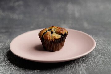 rustic cupcake on pink plate