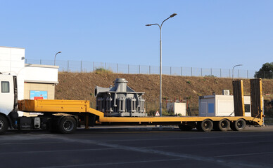 Giant size water pump loaded on a semi-trailer