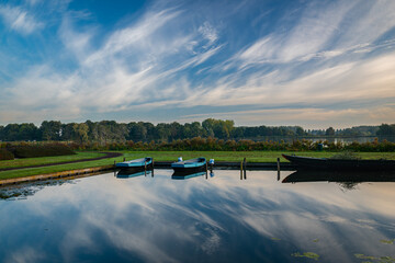 Rowing boats are moored in recreation area 't Weegje near Gouda, the Netherlands. Beautiful...