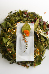 A tea bag for one cup. A group of herbs for Carpathian tea. Natural herbs and flowers for a healthy drink