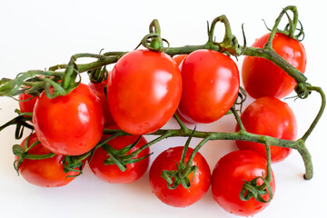 Cherry tomatoes. ripe red cherry tomatoes. lie on a white background