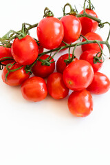 Cherry tomatoes. ripe red cherry tomatoes. lie on a white background