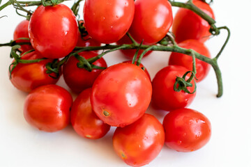 Cherry tomatoes. ripe red cherry tomatoes. lie on a white background