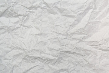 White crumpled wrinkled paper abstract texture background