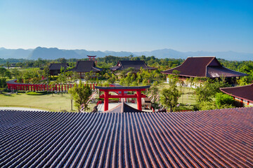 High angle view from a roof-top building overlooking Hinoki Land Thailand, a tourist attraction in Chiang Mai, is a beautiful Japanese-style attraction in a park.
