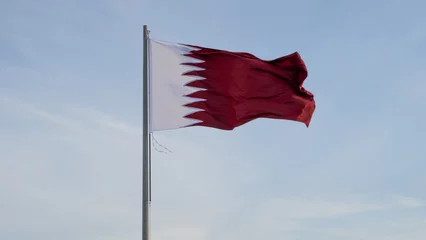 Fotobehang qatar flag flying high in the wind.. © MSM
