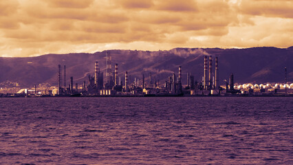 Oil refinery plant. Petrochemical industrial factory. Oil and gas refinery area. Pipelines plant and Oil tank background