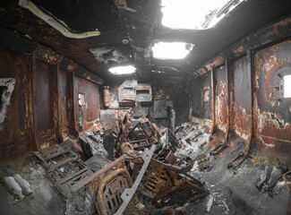 The interior of a burned down Russian armored personnel carrier.