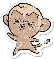 distressed sticker of a cartoon angry monkey