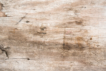 Fotografía de una tabla de madera vieja y desgastada ideal para fondos con textura 