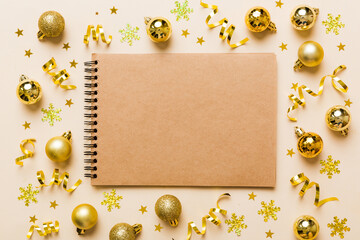 Fototapeta premium Christmas blank greeting card mock-up scene. Creative layout made of Christmas toy and paper card note. Flat lay. Nature New Year concept