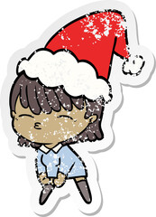 hand drawn distressed sticker cartoon of a woman wearing santa hat