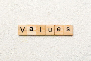 values word written on wood block. values text on table, concept