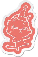 tough quirky cartoon  sticker of a cat wearing santa hat