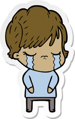 sticker of a cartoon woman crying